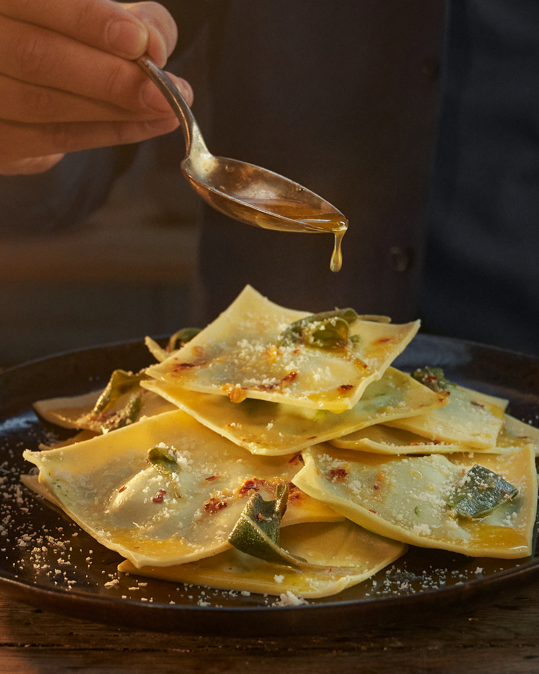 RAVIOLI STUFFED WITH SPINACH AND RICOTTA WITH A SAGE, CHILLI AND LEMON BUTTER